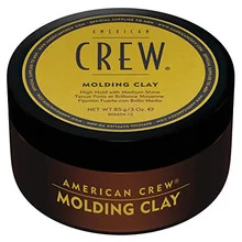 Molding clay on hair for men